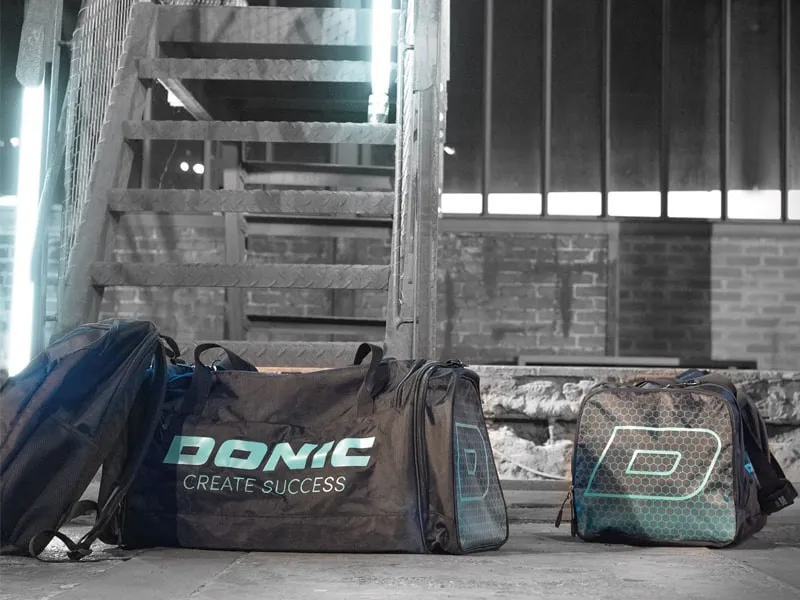 DONIC Mochila SWELL Negra  y Bolsa de deporte Brush